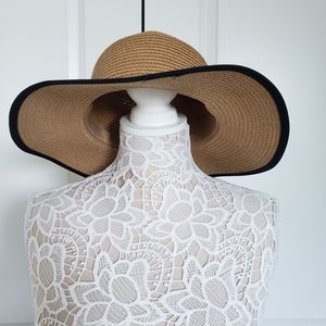Brand new w/ tags woven hat with black trim.